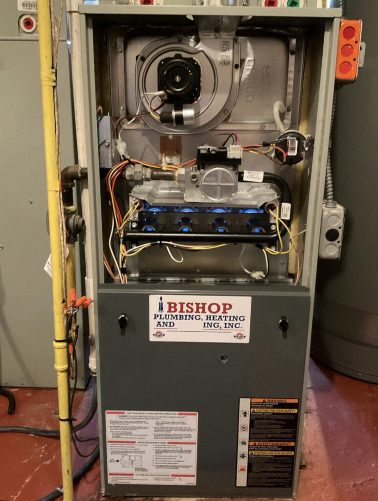 A furnace with its front panel off